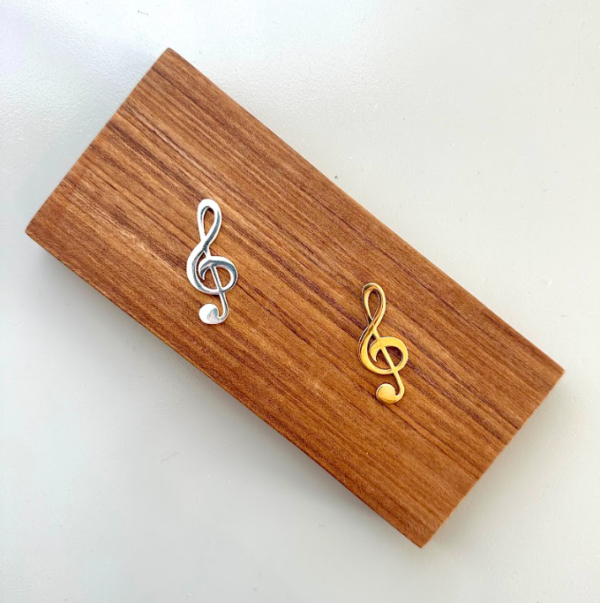 Petite clave de sol de bronce